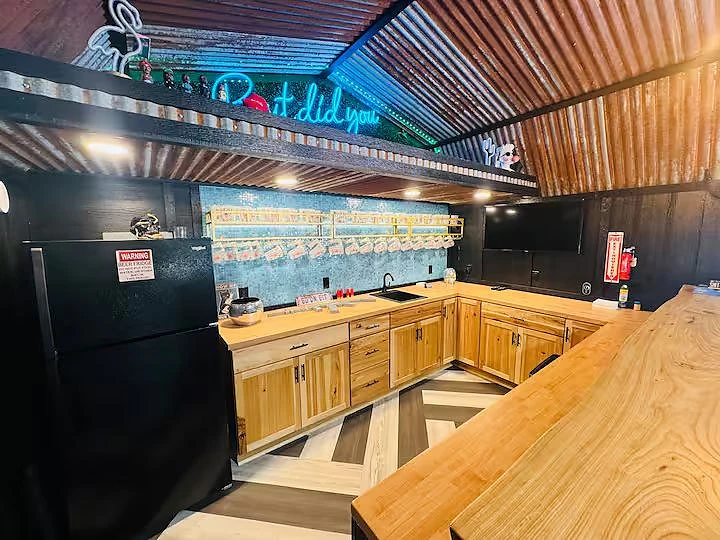 Built-in bar and stools inside the Moto Supreme bar cabin