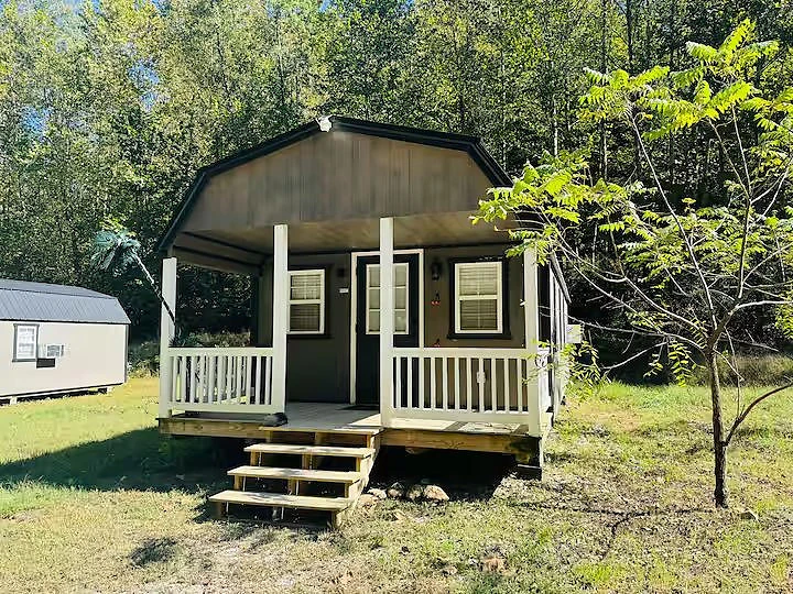 Cabin and surrounding woods at Moto Supreme in Norman, Indiana