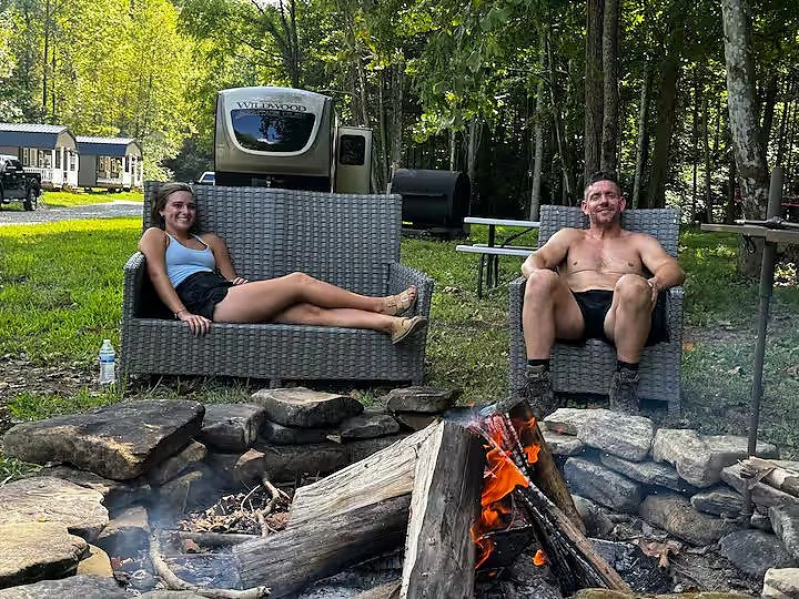 Stone fire ring surrounded by woods at Moto Supreme